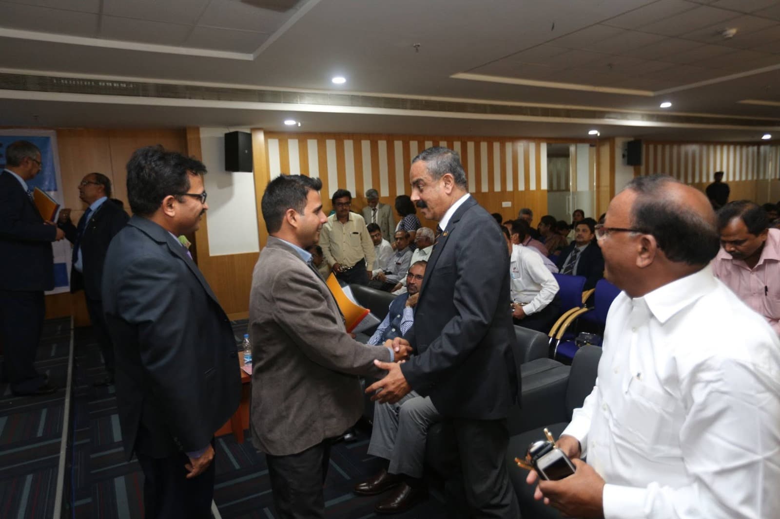 Mr. Aslam Logade being greeted by Amity University Mumbai dignitaries