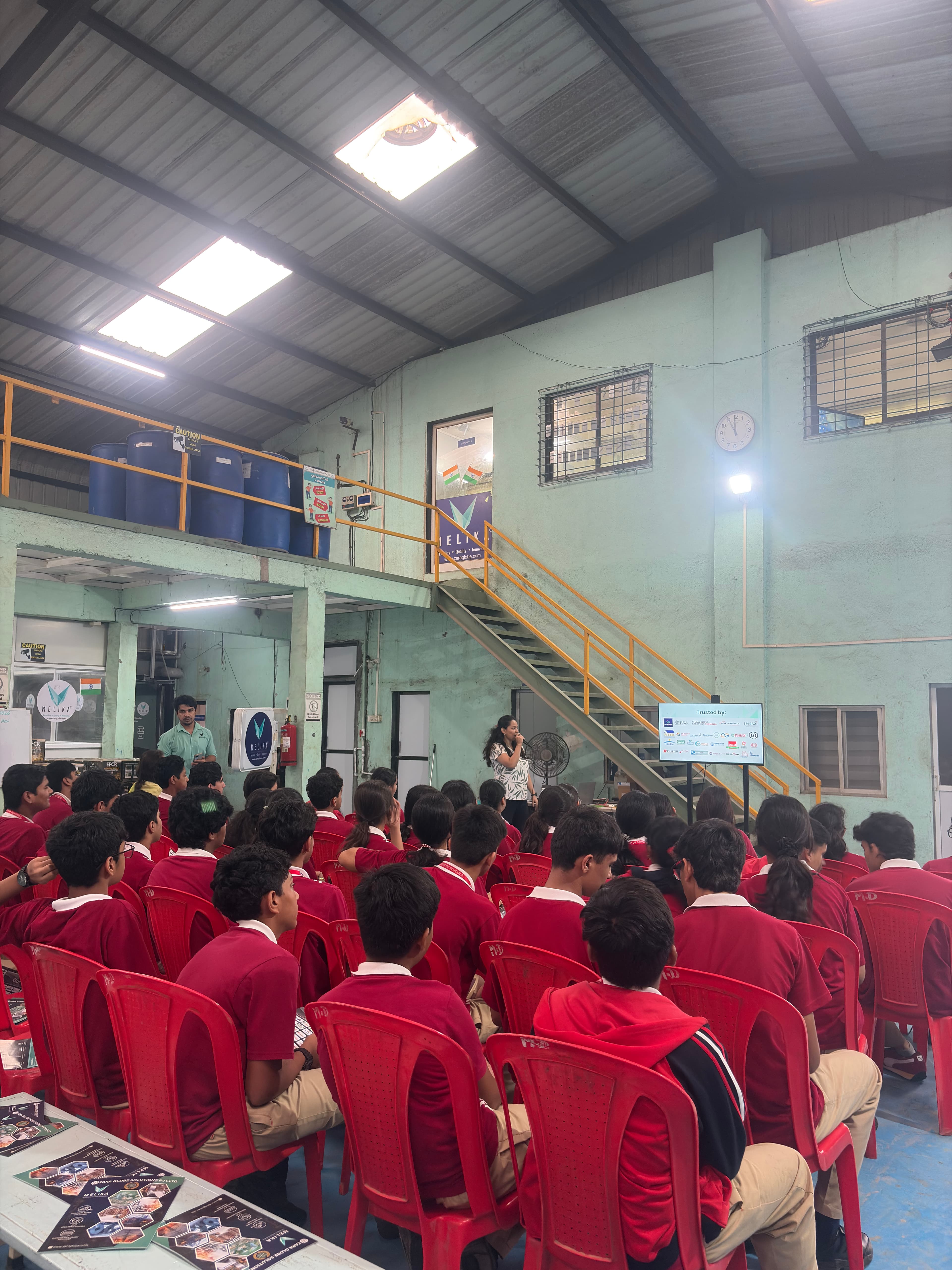 VIBGYOR HIGH, Kharghar students seated during the industrial visit