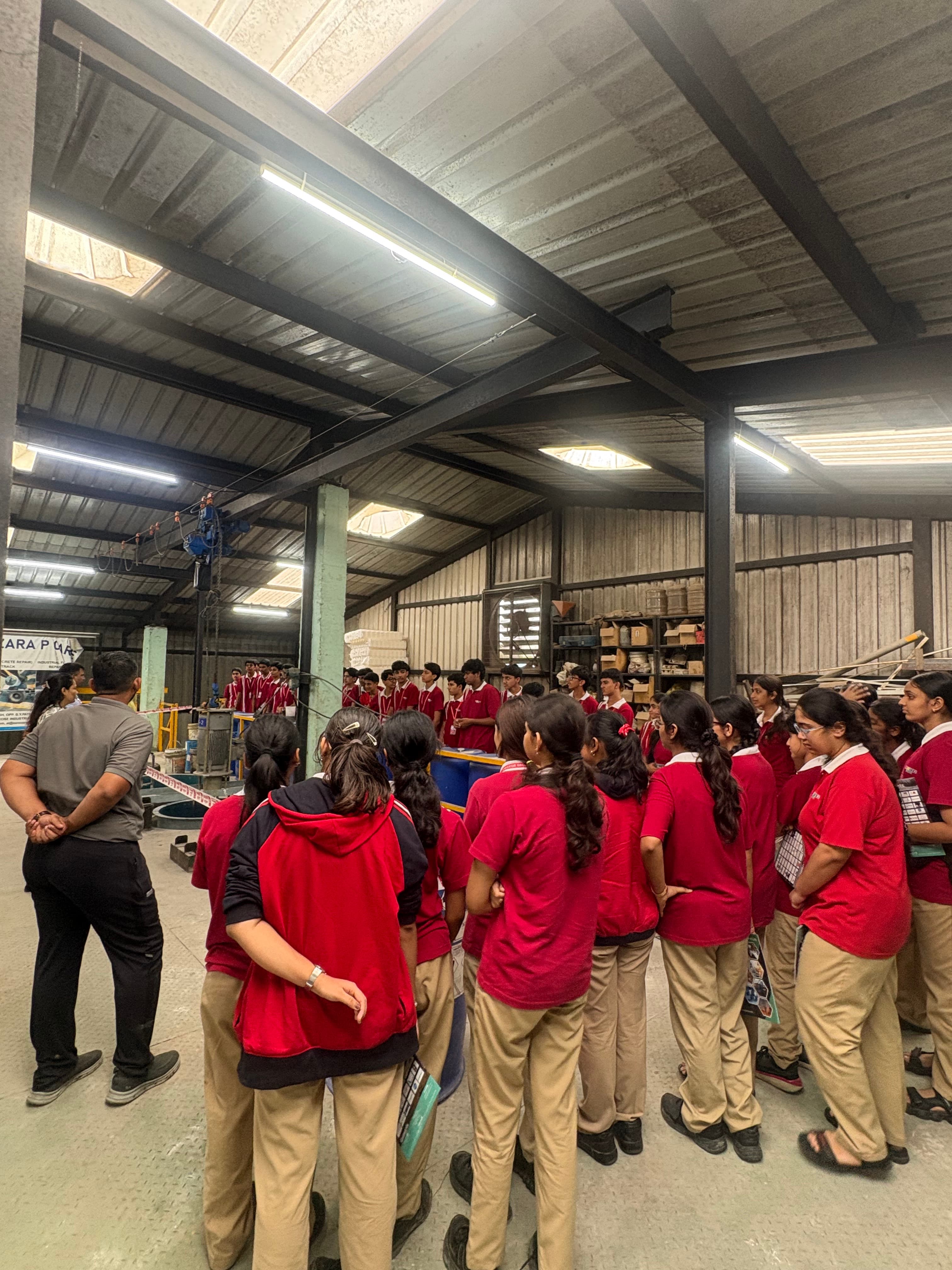 VIBGYOR HIGH, Kharghar students walking through the Zara Globe Solutions facility